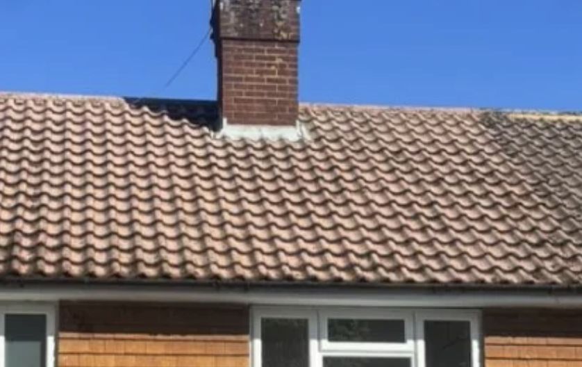 Clean tiled roof with chimney after Arcline roof clean